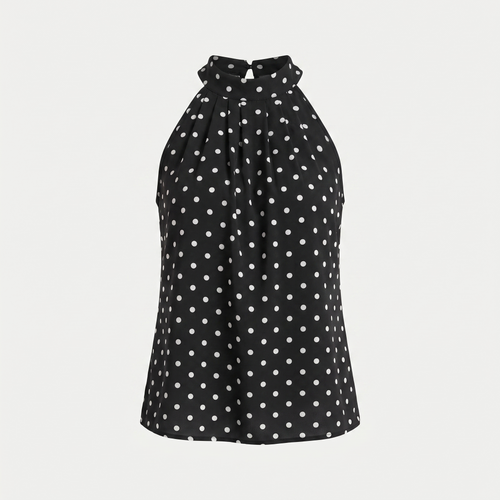 A black halter-style top with a white polka dot pattern, shown against a light gray background.