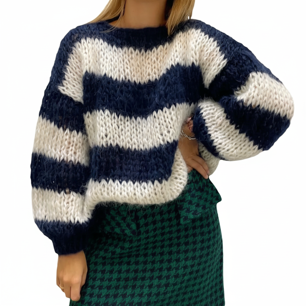 Oversized chunky knit sweater with navy and white stripes, crew neckline, and voluminous balloon sleeves.