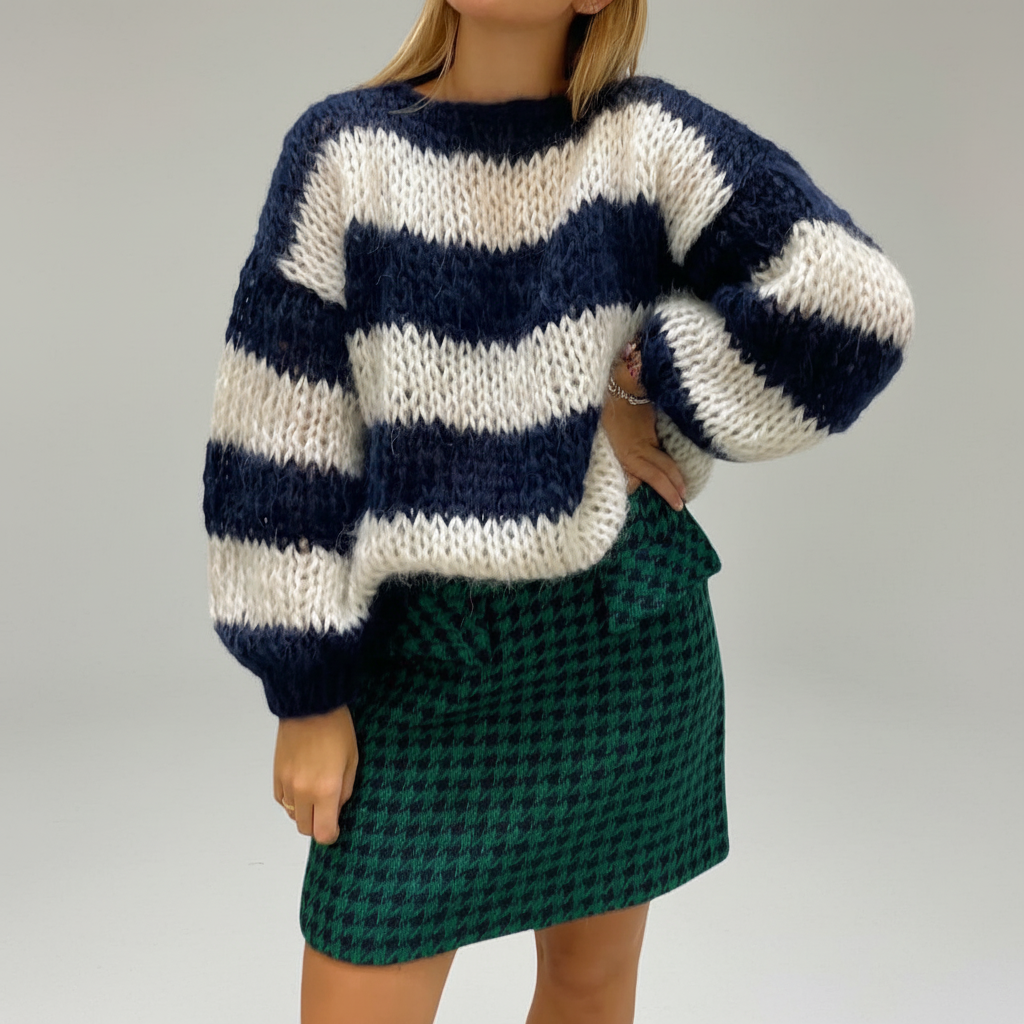 Oversized chunky knit sweater with navy and white stripes, crew neckline, and voluminous balloon sleeves.