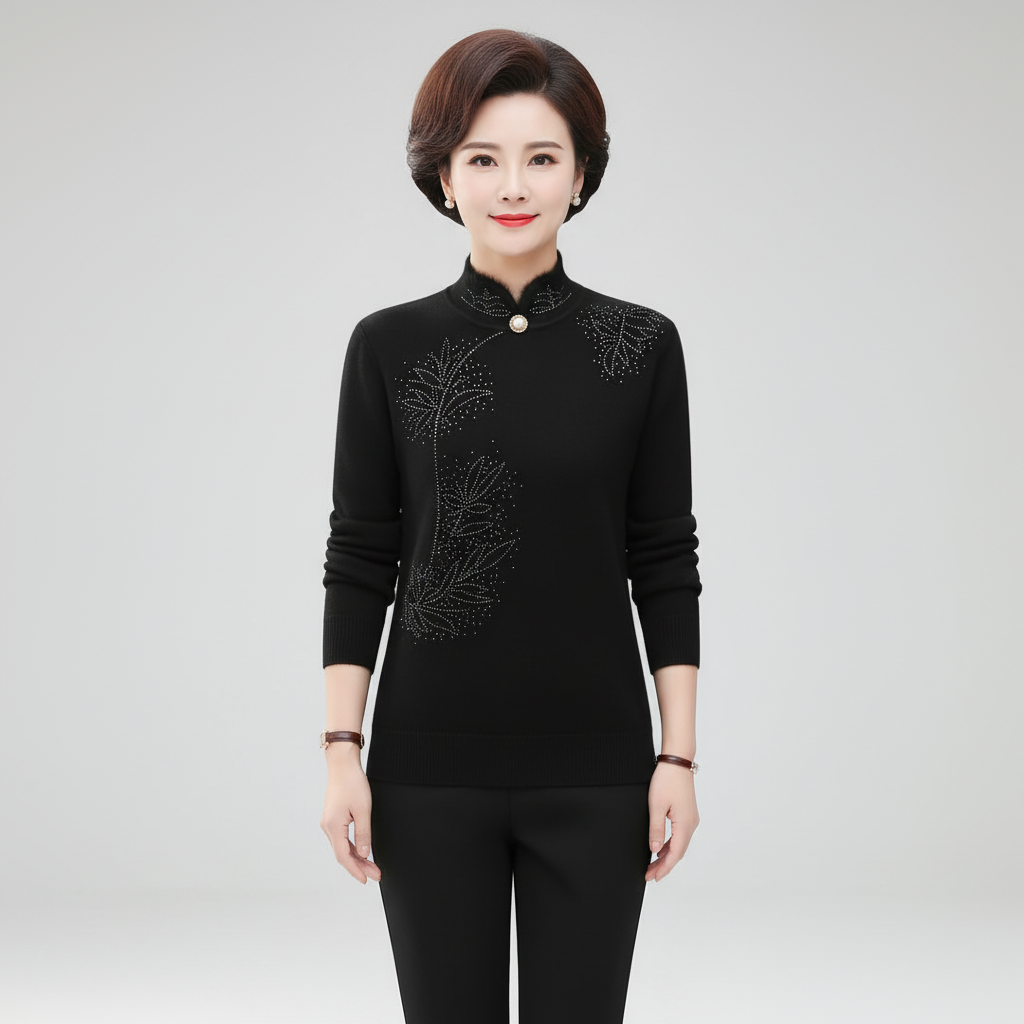 Black long-sleeve sweater with a high mandarin collar, single button detail, and delicate floral print accents.