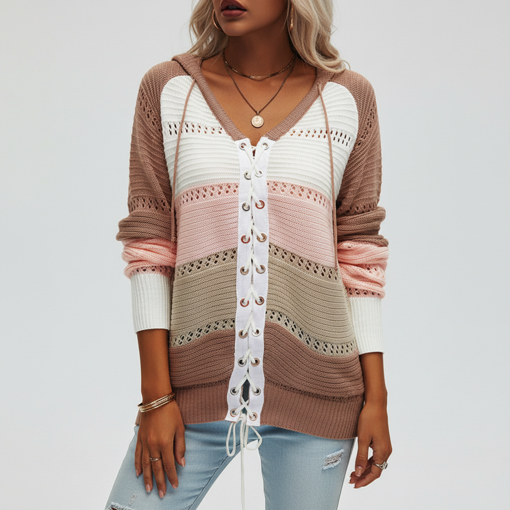 Relaxed hooded sweater with multi-colored openwork knit panels and a white lace-up front closure.