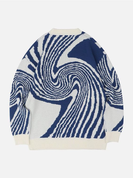 Women’s soft knitted pullover sweater featuring a blue and white abstract swirl pattern with a ribbed crew neck and hem.