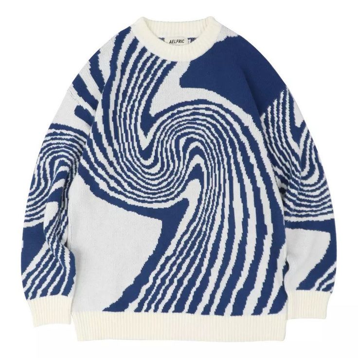 Blue and white knitted pullover sweater featuring a bold, abstract swirling wave pattern and a classic crew neckline.