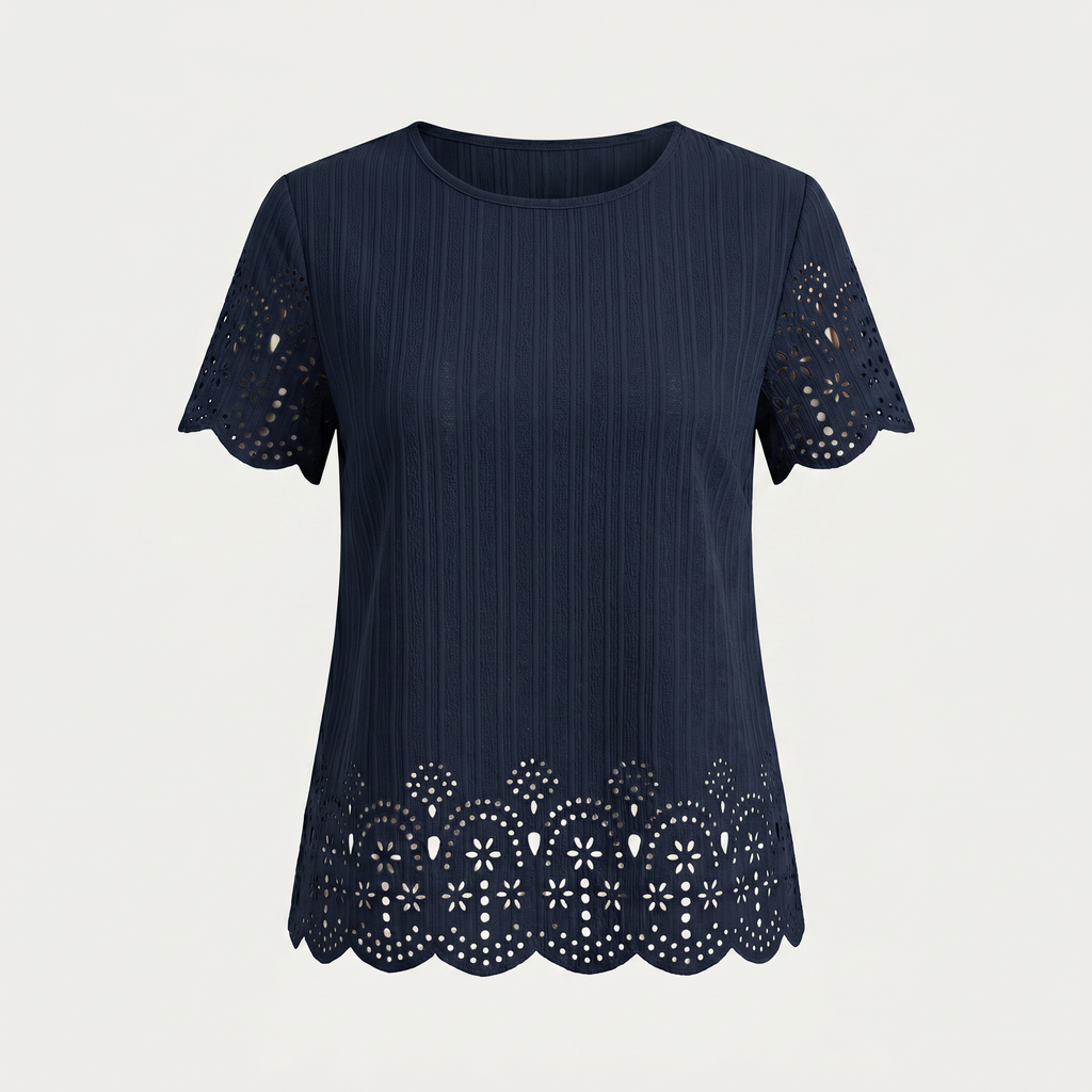 A navy blue short-sleeve top with vertical pinstripes, featuring eyelet lace cutouts on the sleeves and a scalloped eyelet hem, shown against a light gray background.