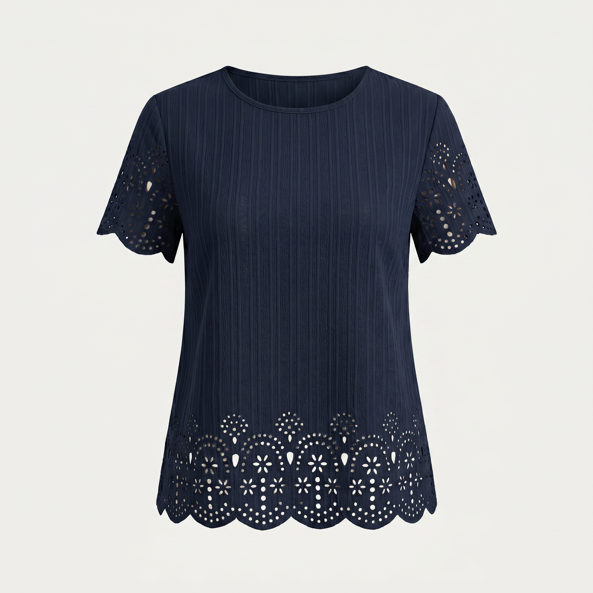A navy blue short-sleeve top with vertical pinstripes, featuring eyelet lace cutouts on the sleeves and a scalloped eyelet hem, shown against a light gray background.