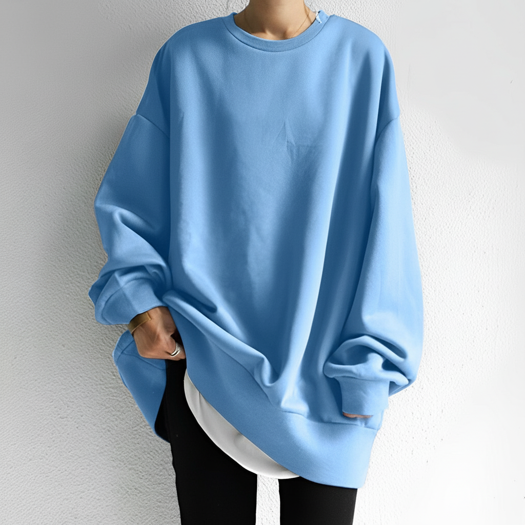 Light blue oversized crew neck sweatshirt with dropped shoulders and ribbed trims.
