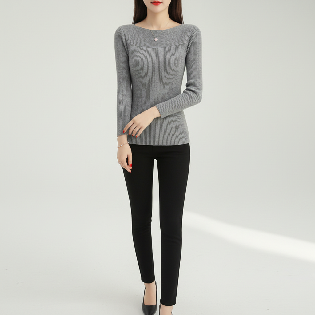 Grey slim-fit ribbed sweater with a notched neckline and horizontal panel detailing, worn with black trousers.