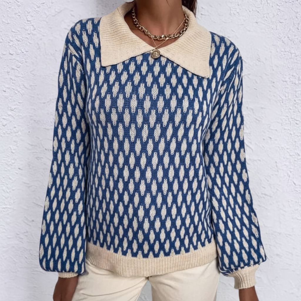 Blue and cream printed ribbed knit sweater with a broad pointed collar and long sleeves.