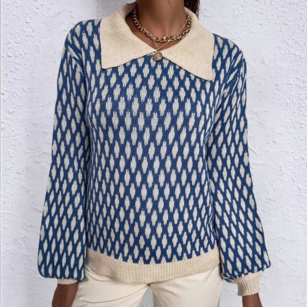 Blue and cream printed ribbed knit sweater with a broad pointed collar and long sleeves with ribbed cuffs.