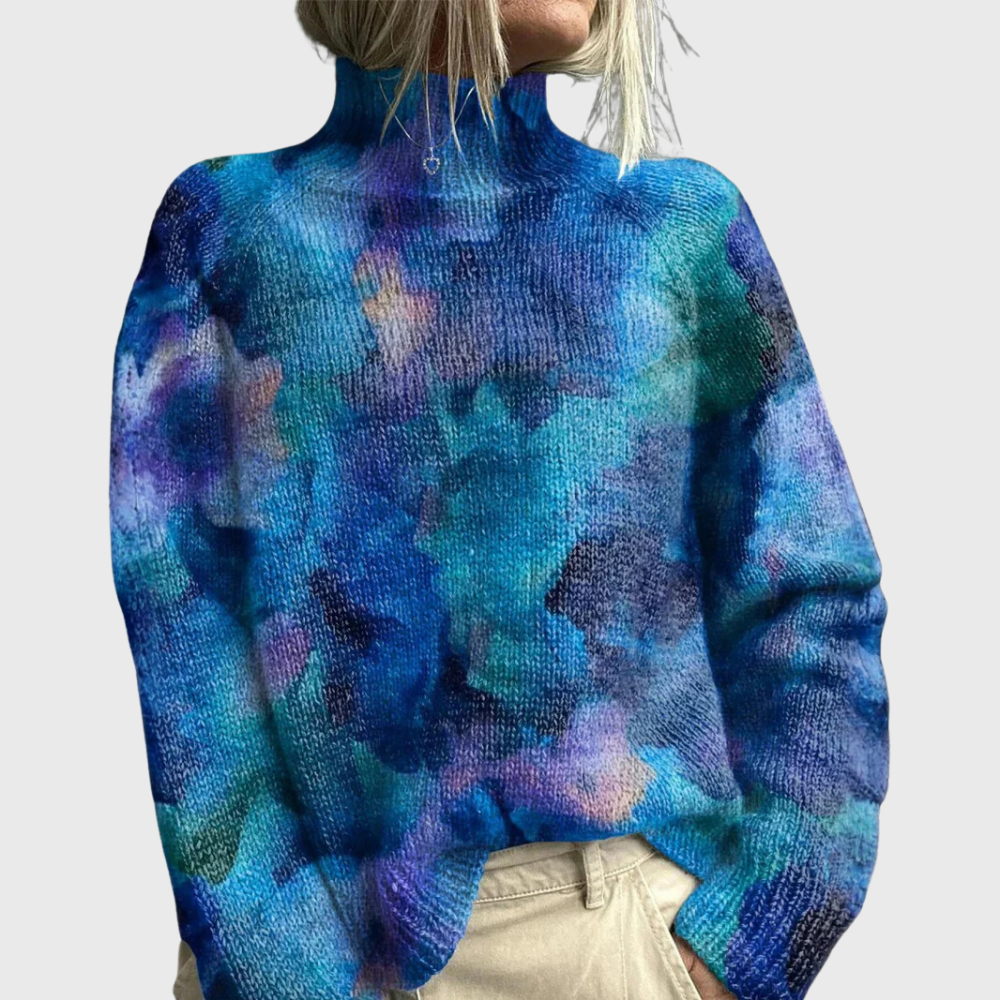 Blue printed turtleneck sweater in a relaxed ribbed knit with long sleeves and a high roll neck.