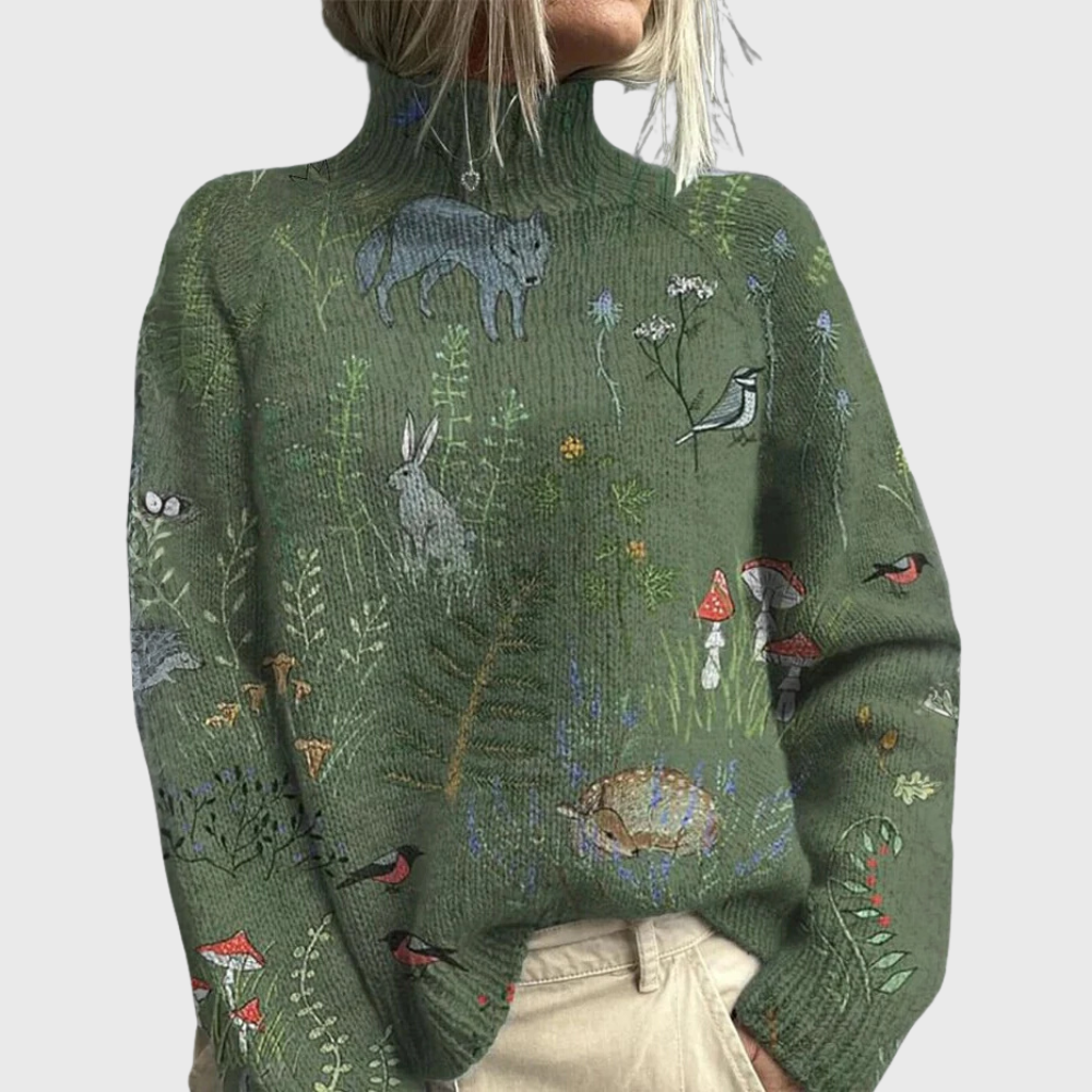 Army green ribbed turtleneck sweater featuring a whimsical forest print with animals, birds, and mushrooms.