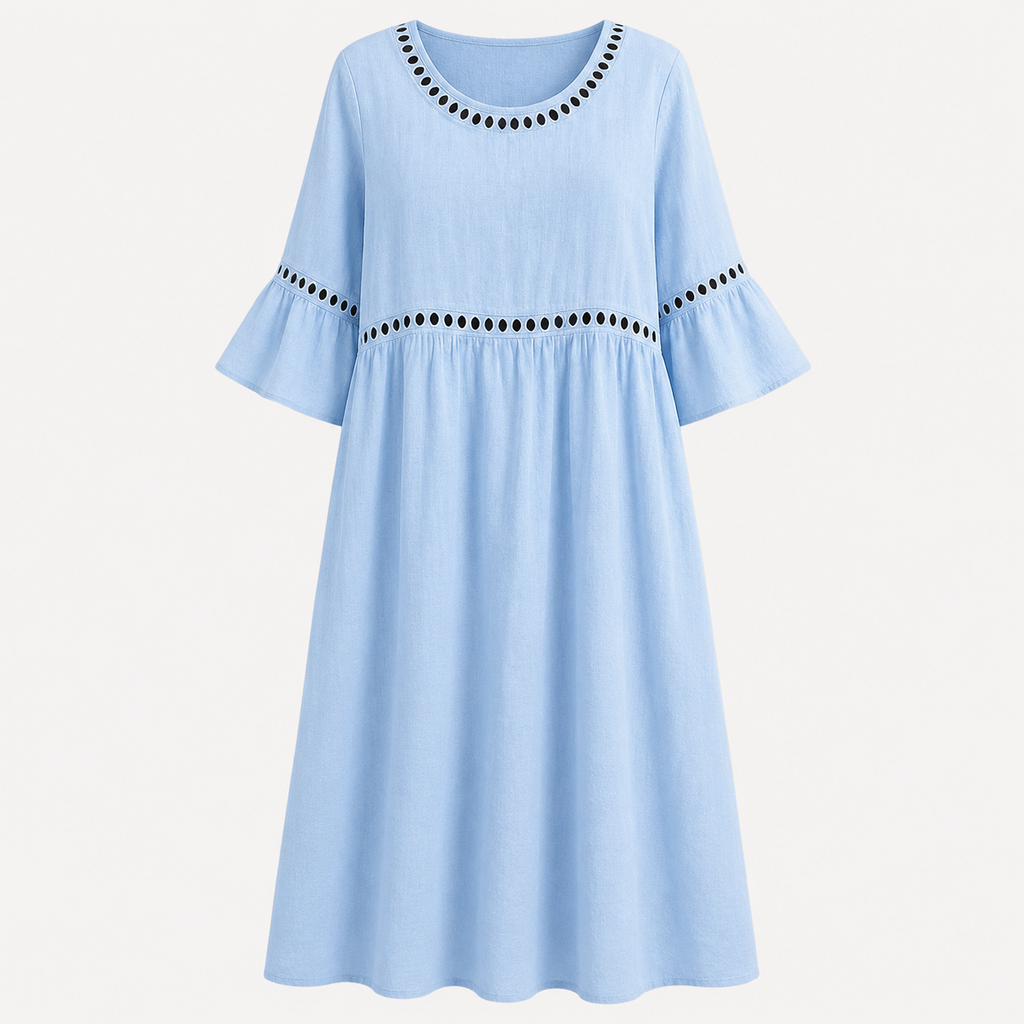 A light blue A-line dress with three-quarter bell sleeves, featuring black embroidered dot trim around the round neckline and across the waist, shown against a plain off-white background.