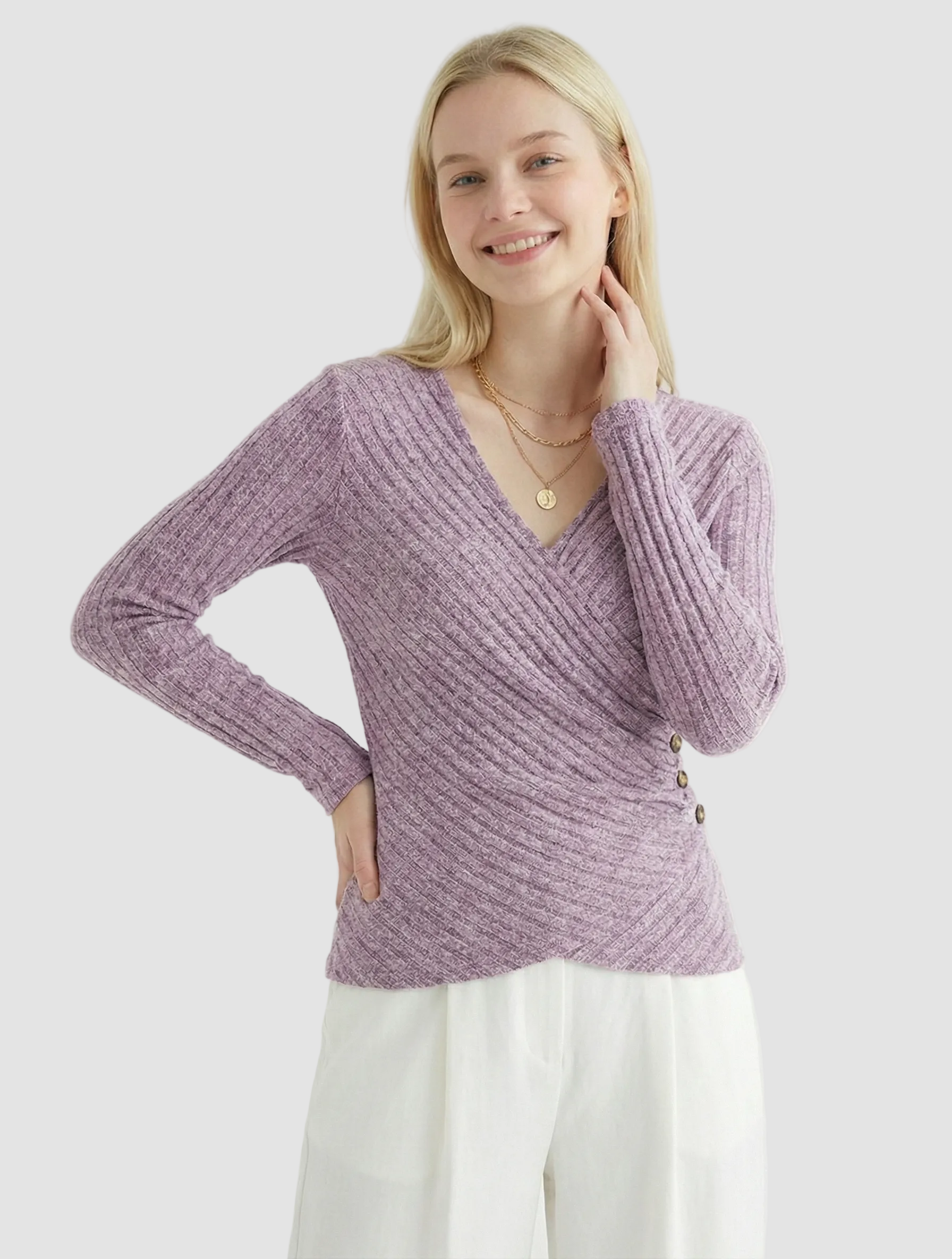 Lavender ribbed knit wrap top with long sleeves, V-neck, and side button accents on a model.