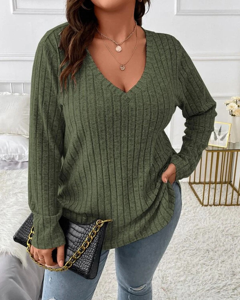 Olive green ribbed V-neck long sleeve jumper in a soft cotton blend with a comfortable, relaxed fit.