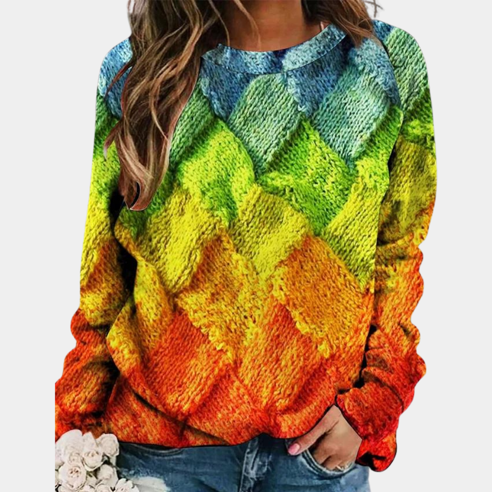 Relaxed fit sweater with a round neckline, raglan sleeves, and a vibrant, multi-colored textured knit pattern.