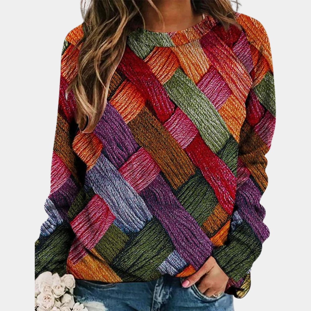 Relaxed-fit sweater with a multicolored woven knit texture, round neckline, and long raglan sleeves.