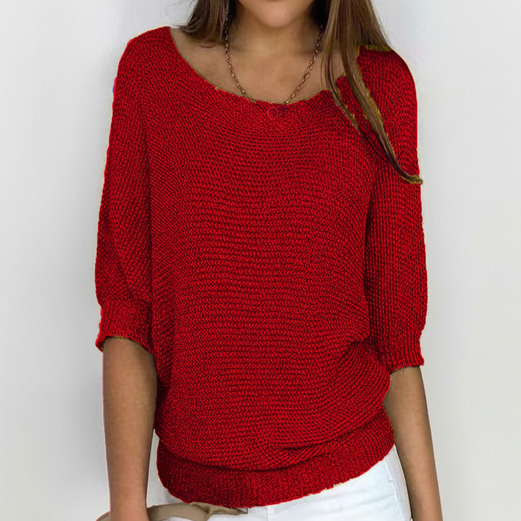 Red relaxed-fit sweater with a wide neckline, dolman sleeves, three-quarter gathered cuffs, and a ribbed hem.