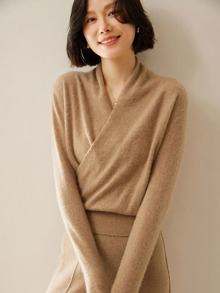 Khaki slim-fit knit sweater featuring a feminine crossover wrap neckline and long sleeves with ribbed hem.