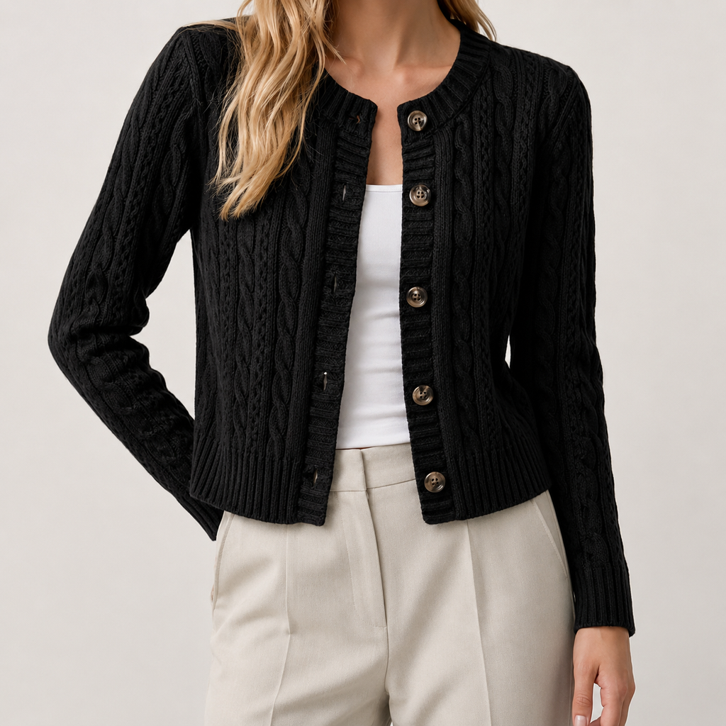 Black cable knit cropped cardigan with a round neckline, button-through front, and ribbed trim.