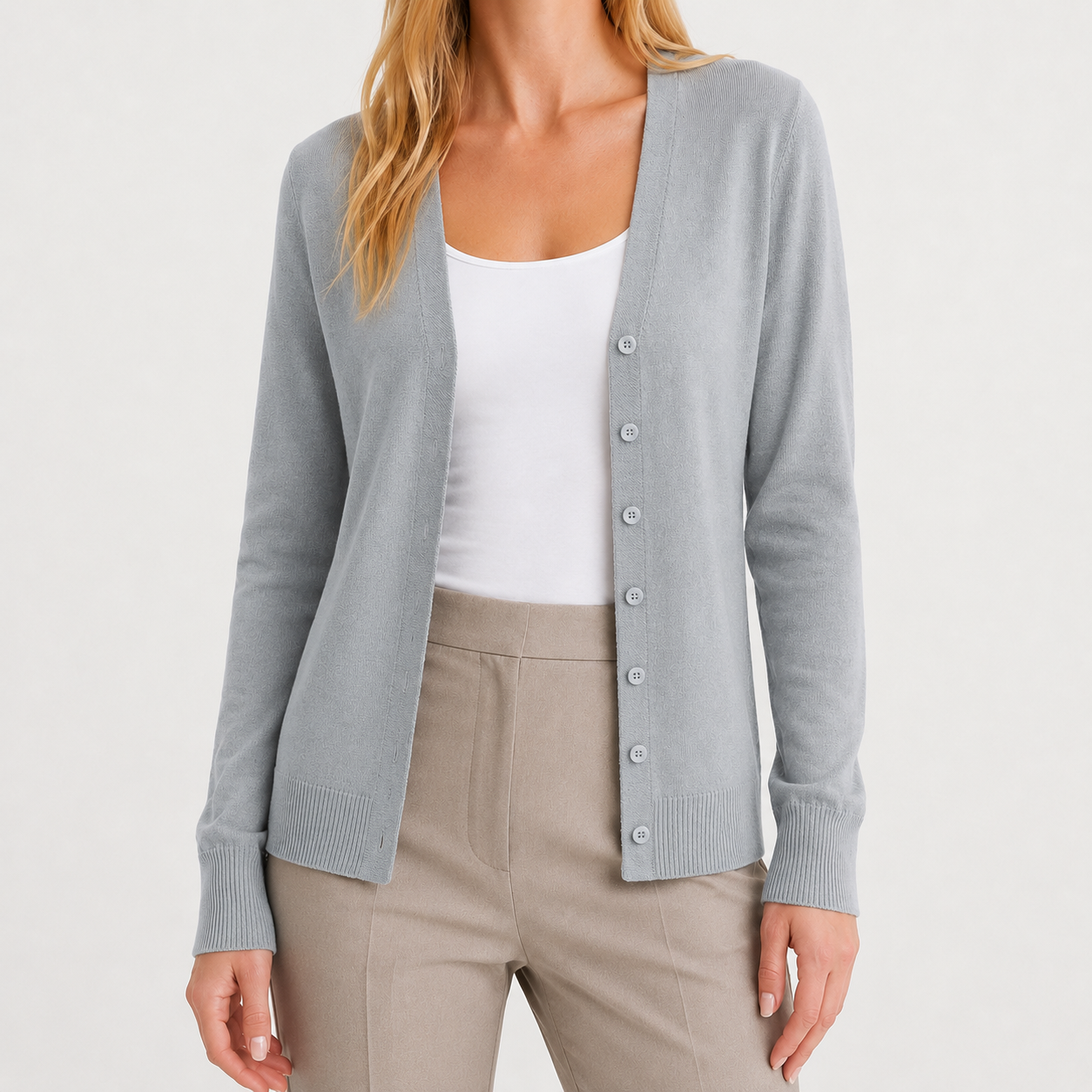 Light grey fine-knit V-neck cardigan with a button-front, long sleeves, and ribbed cuffs and hem.