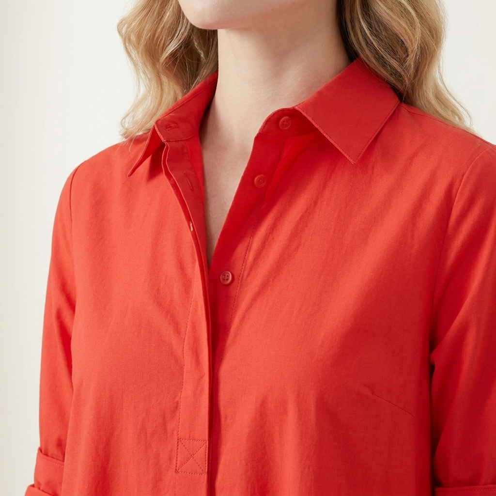 Close-up of the red dress collar and button placket detail