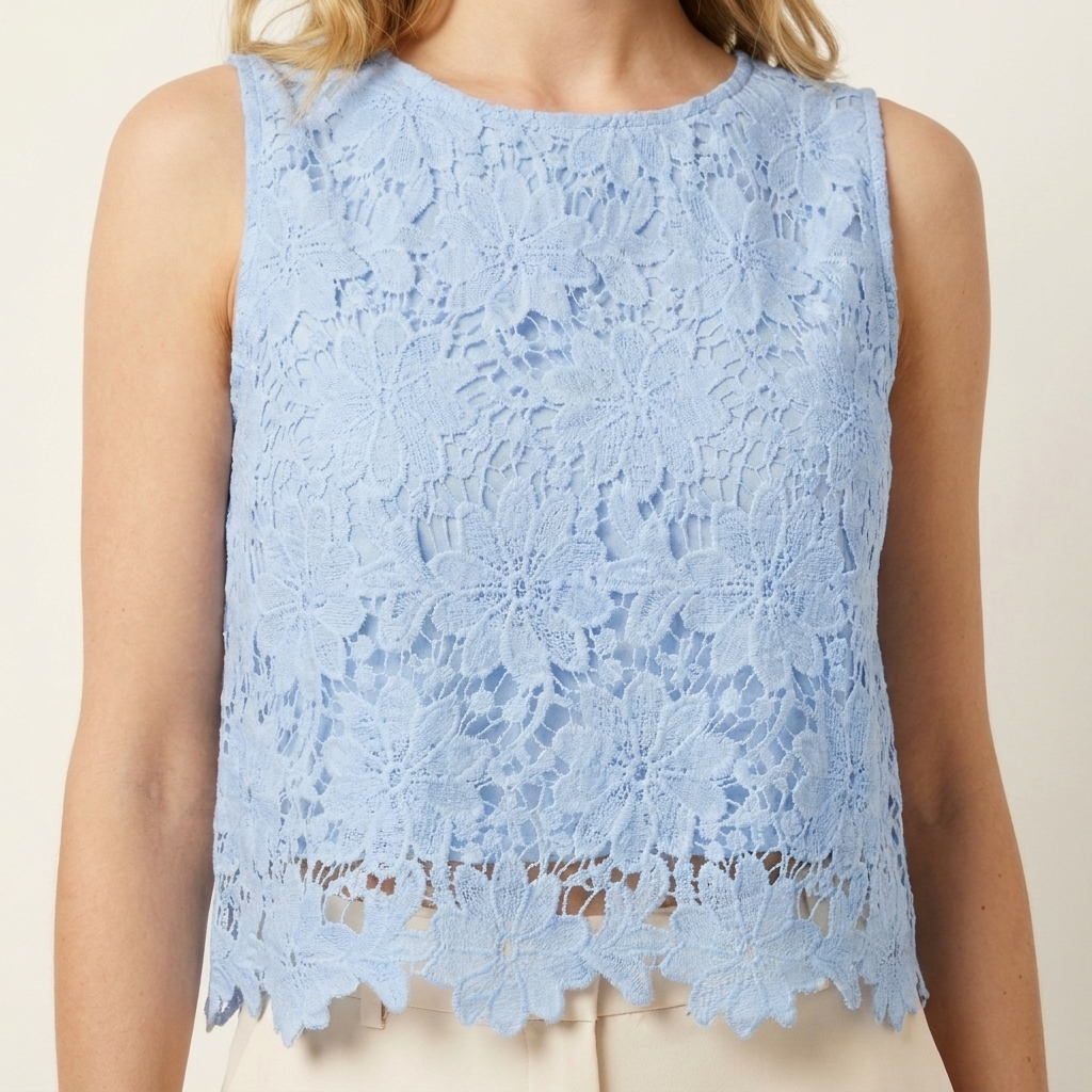 Close-up of the blue top lace panel and scallop trim detail