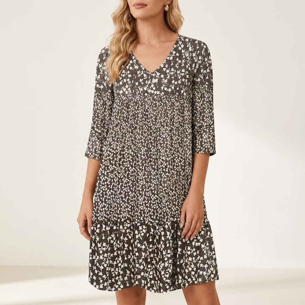 Woman wearing a brown midi dress with a soft tailored silhouette, front studio view