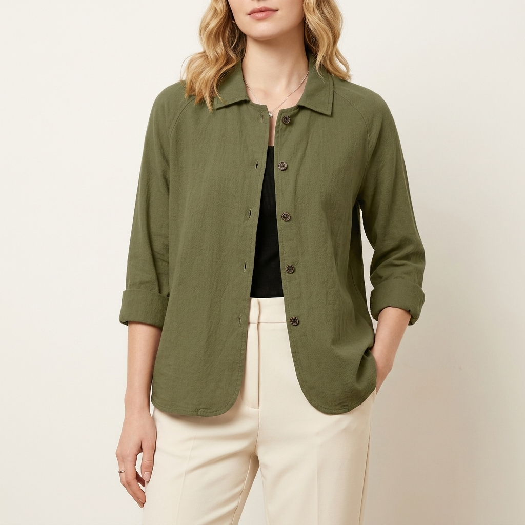 Woman wearing an olive green relaxed layering top, front studio view