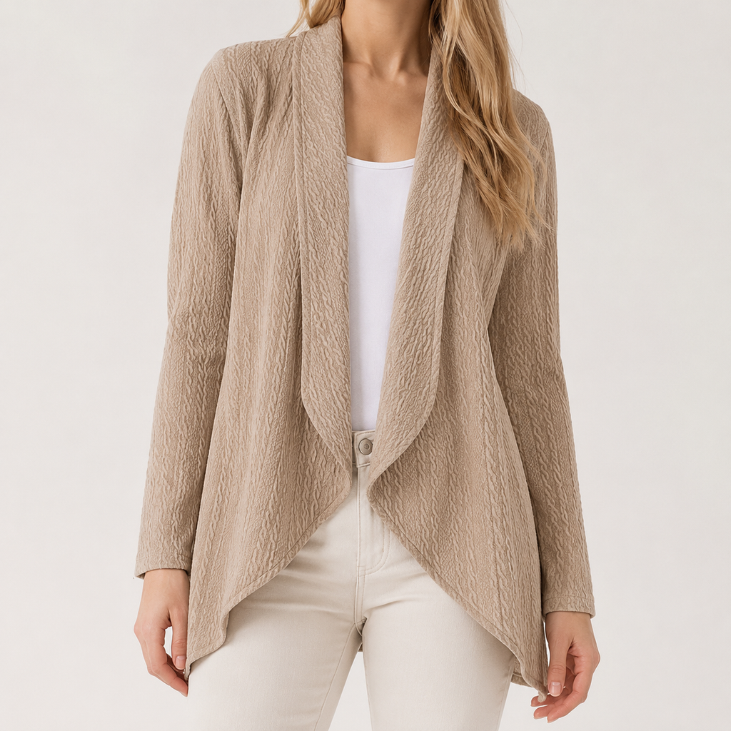 Beige textured waterfall cardigan with an open front and long sleeves, worn over a white top and light trousers.
