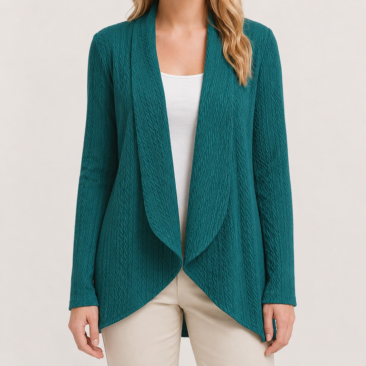 Teal textured open-front cardigan with a draped waterfall neckline and long sleeves worn over a white top.